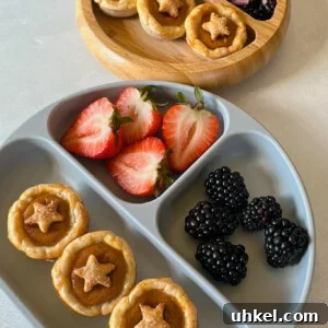 Mini Pumpkin Pies Sweetened with Maple Nectar 12 Maple sweetened mini pumpkin pies served with strawberries and blackberries.