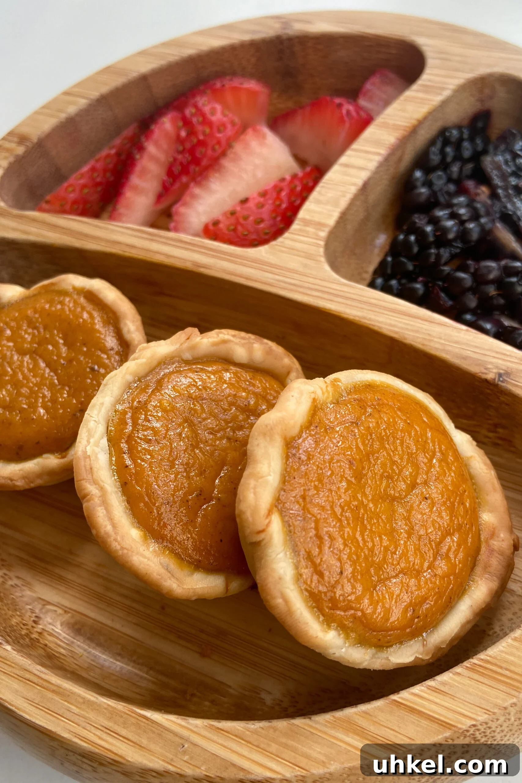 Mini Pumpkin Pies Sweetened with Maple Nectar 6 Mini pumpkin pies served with strawberries and blackberries
