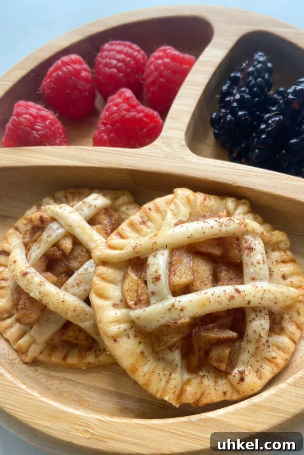 Mini Pumpkin Pies Sweetened with Maple Nectar 10 Healthy mini apple pies served with berries