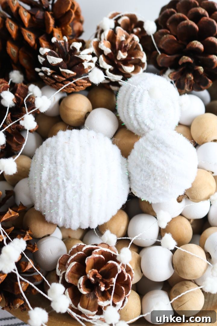 31 Cozy Winter Home Decor Ideas to Refresh Every Room 13 pipe cleaner snow balls