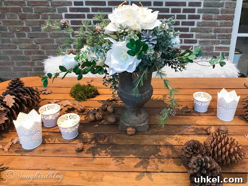 31 Cozy Winter Home Decor Ideas to Refresh Every Room 16 winter faux flower table arrangement