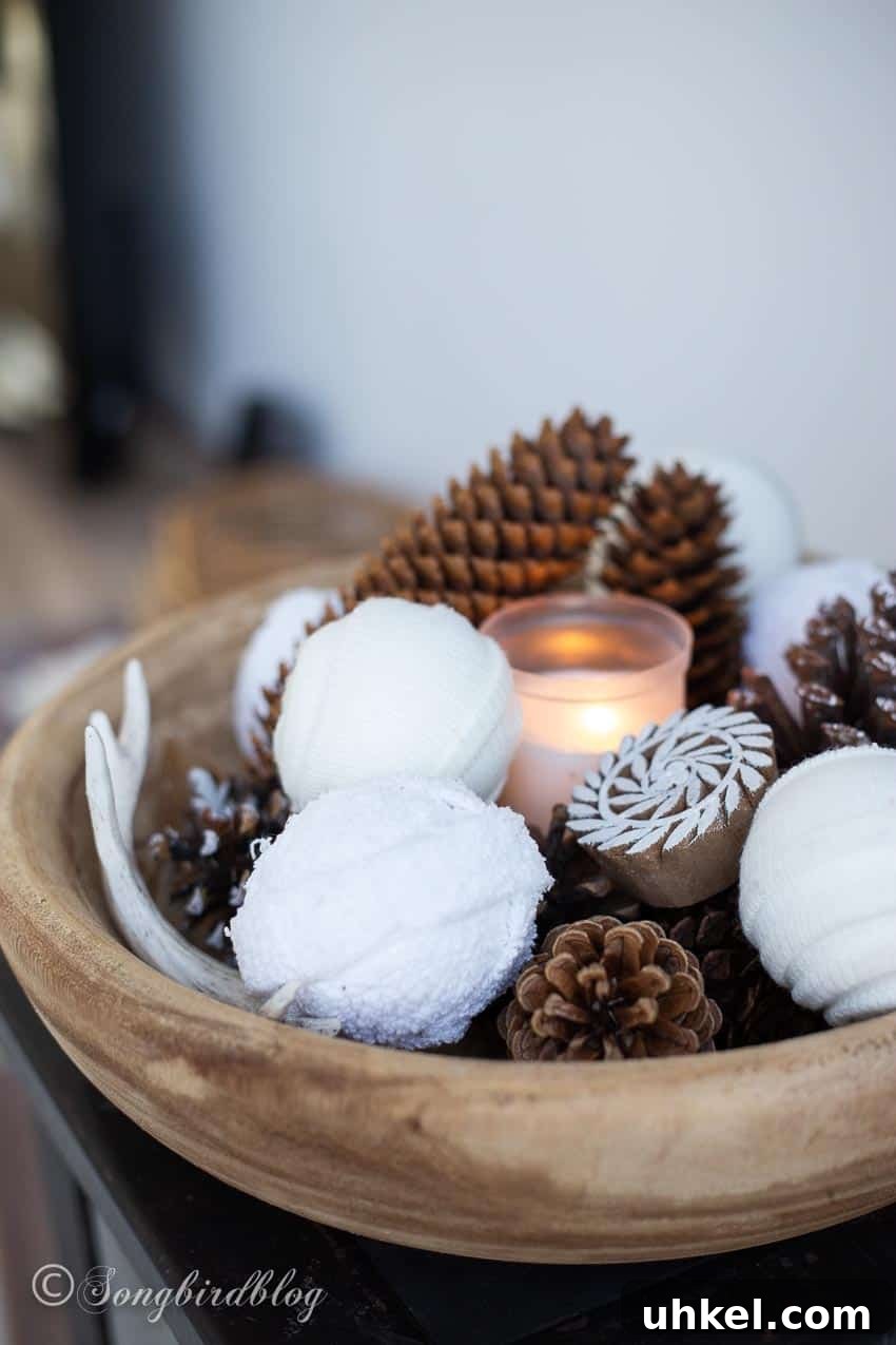 31 Cozy Winter Home Decor Ideas to Refresh Every Room 18 fabric snowballs