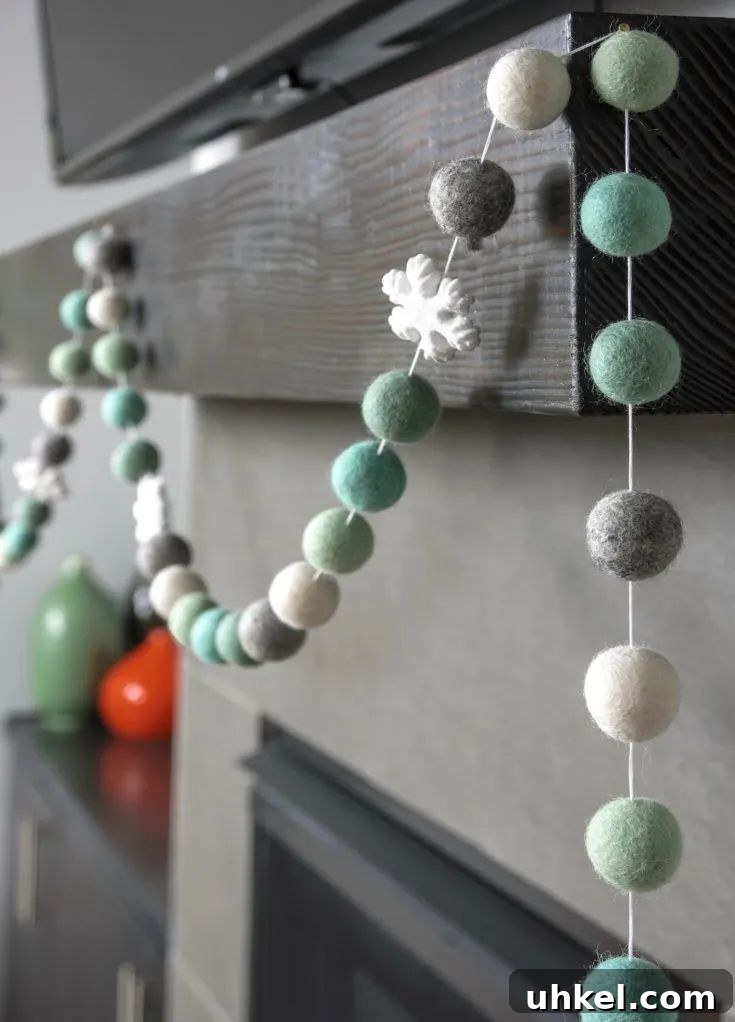31 Cozy Winter Home Decor Ideas to Refresh Every Room 10 winter felt ball garland