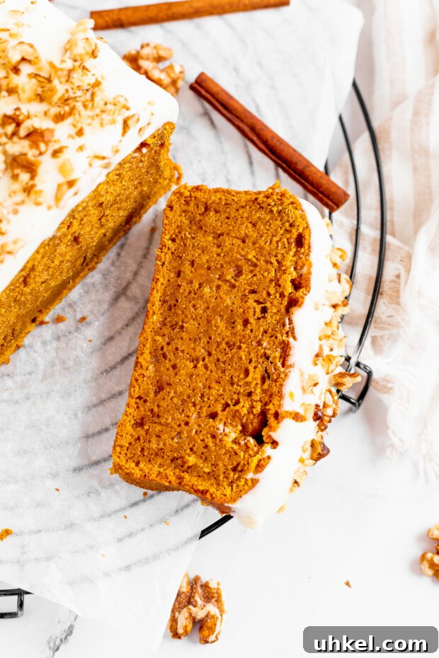 Ultimate Pumpkin Bread Recipe: Moist Spiced Loaf for Fall 5 The Best Pumpkin Bread covered in cream cheese frosting.