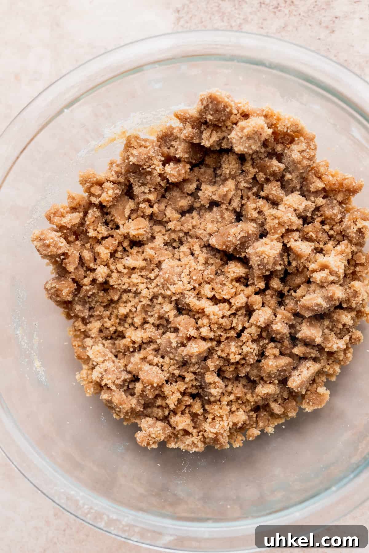 Pumpkin Bread with Cream Cheese Frosting Recipe and Tips 4 Streusel in a glass bowl.