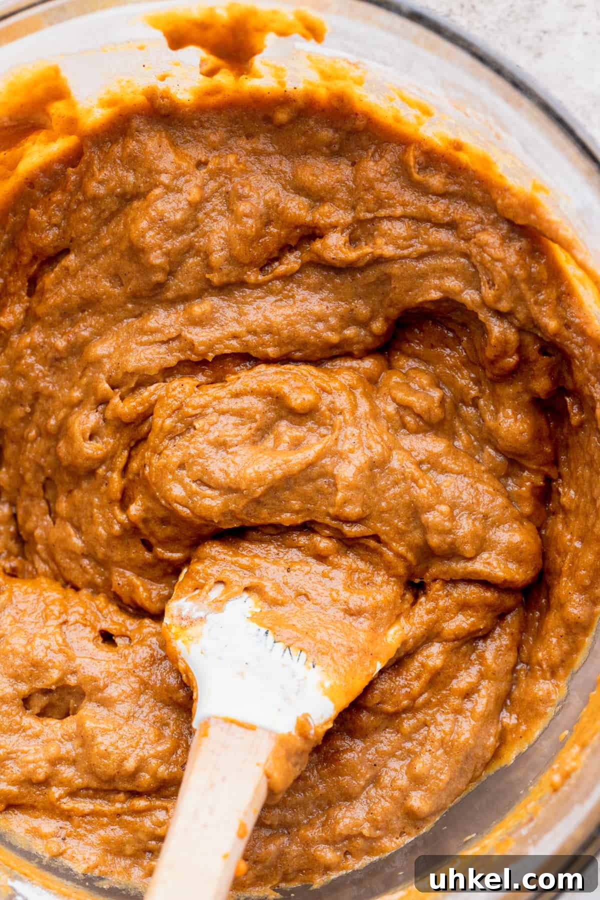 Pumpkin Bread with Cream Cheese Frosting Recipe and Tips 6 Pumpkin batter in a glass bowl.