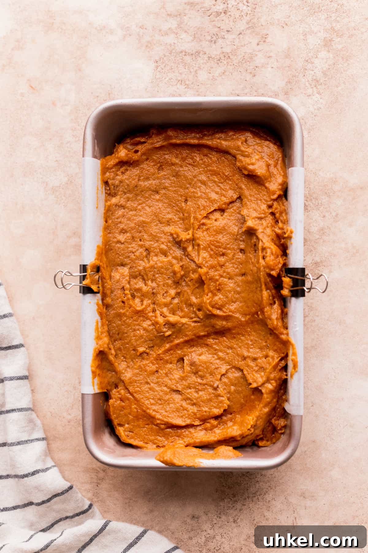 Pumpkin Bread with Cream Cheese Frosting Recipe and Tips 7 Pumpkin batter in a loaf pan.