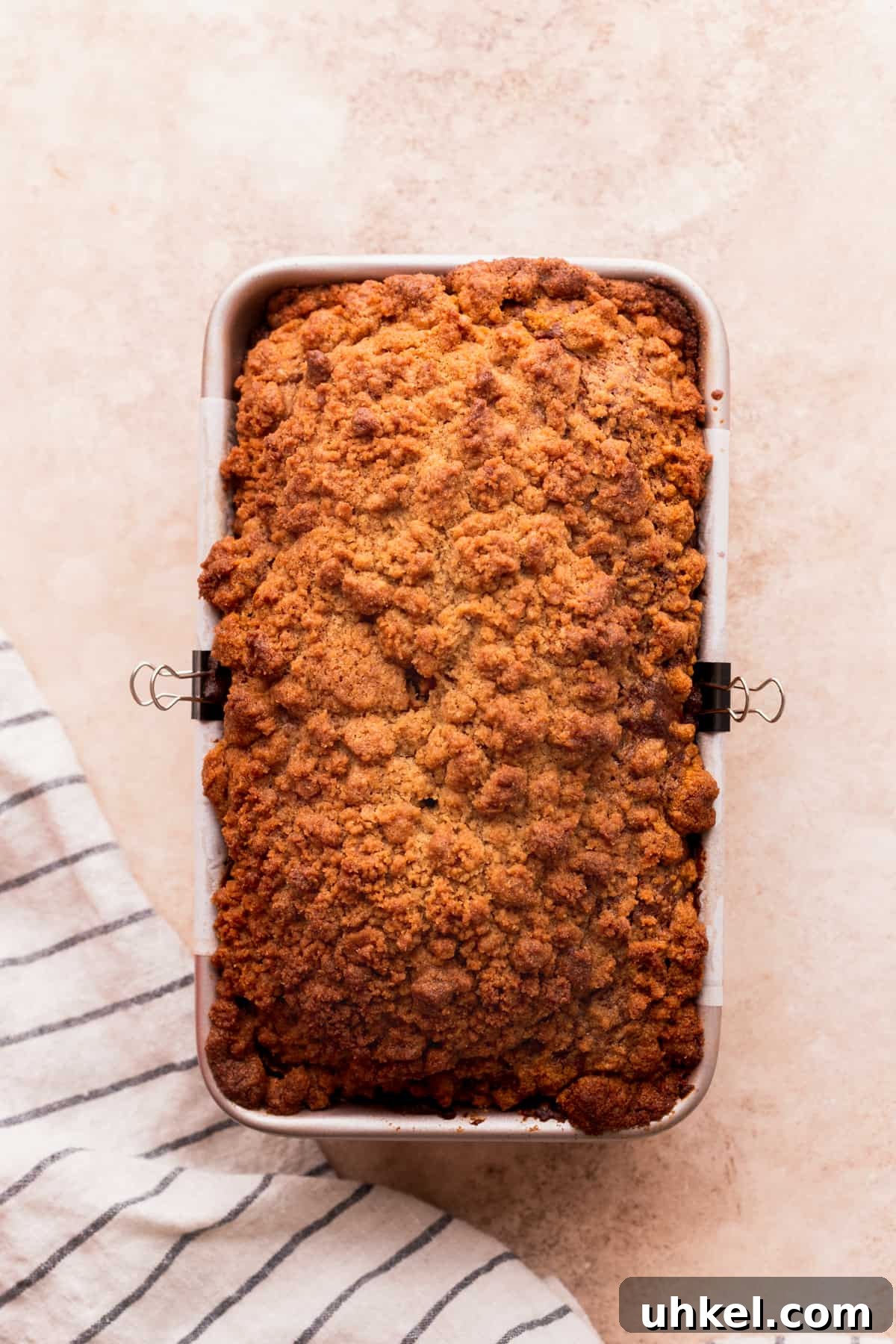 Pumpkin Bread with Cream Cheese Frosting Recipe and Tips 9 Baked bread in the loaf pan.