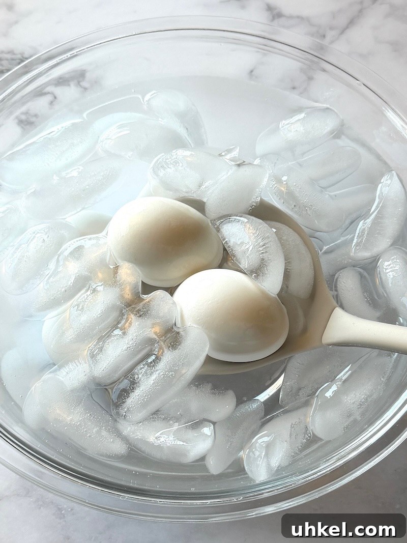 Classic Deviled Eggs Recipe for Gatherings 5 Cooked Eggs in ice water to cool