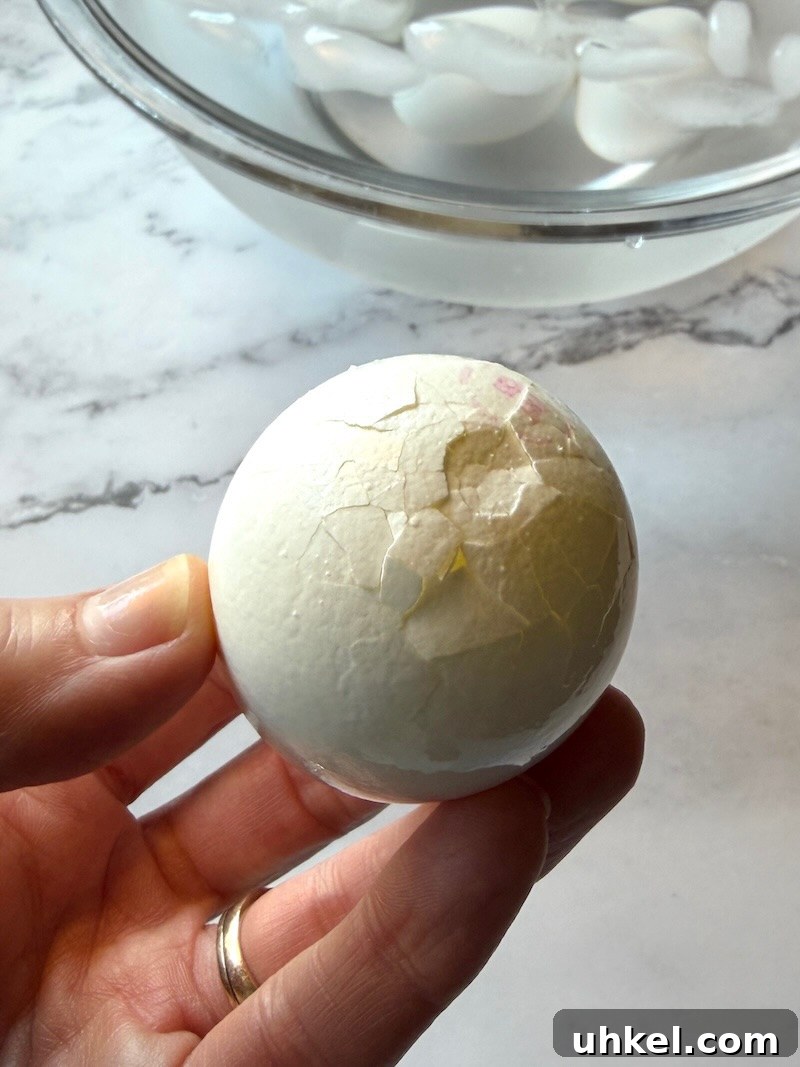 Classic Deviled Eggs Recipe for Gatherings 6 Hard boiled eggs cracked on the bottom