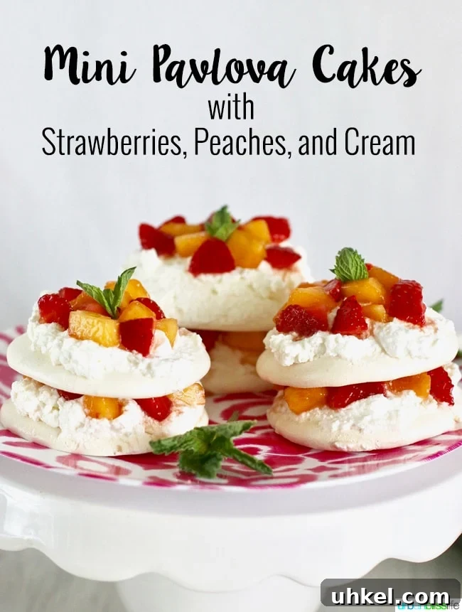 Strawberry & Peach Mini Pavlovas with Whipped Cream 14 Mini Pavlova Cakes with Strawberries, Peaches, and Cream recipe on UrbanBlissLife.com