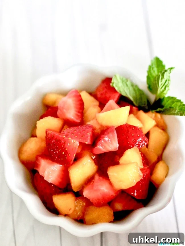 Strawberry & Peach Mini Pavlovas with Whipped Cream 4 Strawberries and Peaches in bowl