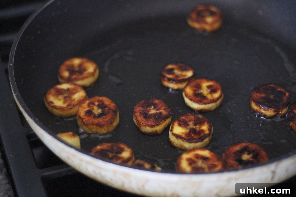 Sweet and Savory Fried Plantains - an easy, 4-ingredient recipe that you can make two ways! Sweet, with coconut butter and cinnamon, or Savory, with garlic and sea salt! | fedandfulfilled.com