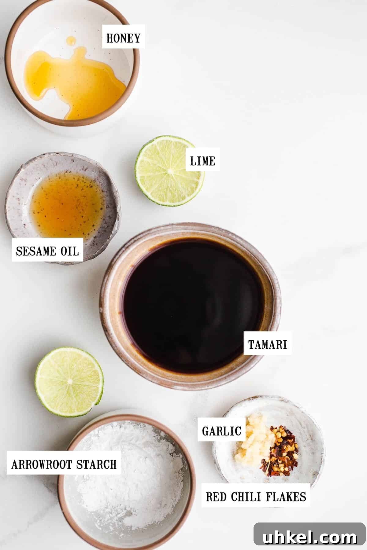 Gluten-Free Stir-Fry Sauce Recipe for Flavorful Quick Meals 3 Ingredients for a gluten-free dressing in small bowls.