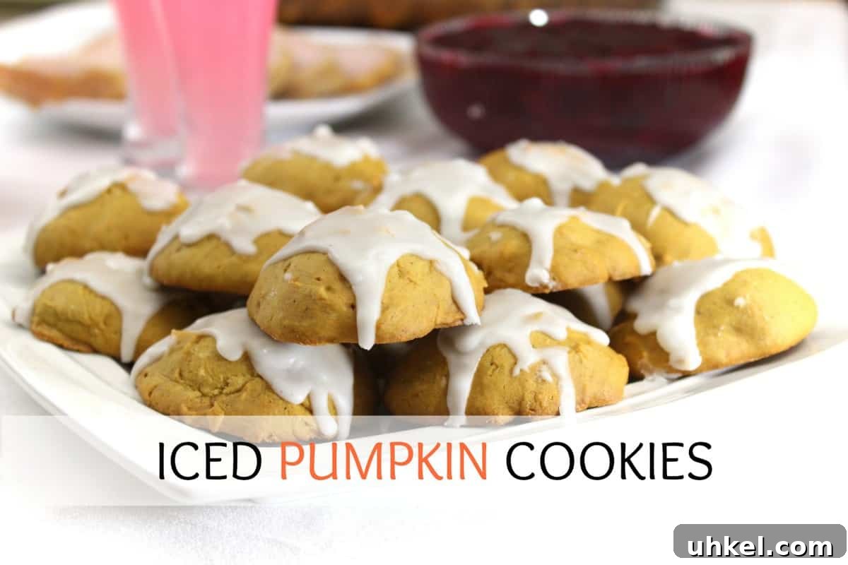 A batch of Pumpkin Cookies on a white dish.
