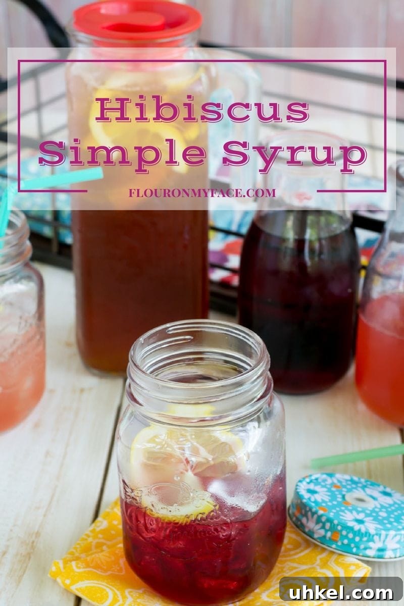 Refreshing Hibiscus Iced Tea Recipe for Summer (Simple Steps) 3 Hibiscus Simple Syrup in a mason jar for iced tea