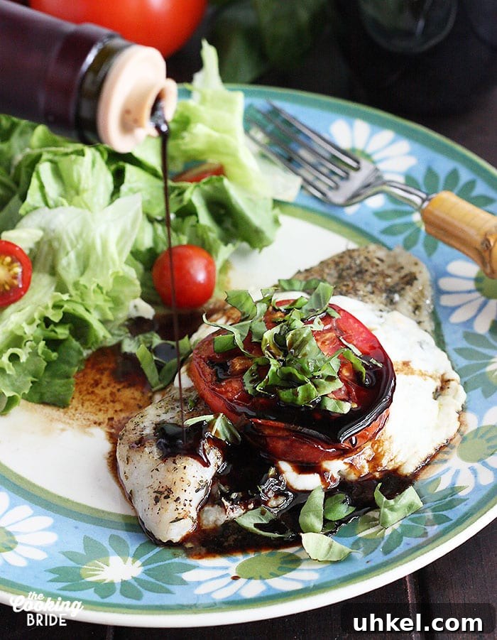 Caprese-Style Baked Catfish Fillets: Tomato, Basil & Mozzarella 2 drizzling balsamic vinegar over a baked catfish fillet