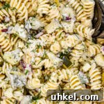 Creamy Dill Pickle Pasta Salad Recipe for Summer Potlucks 9 close up of creamy dill pickle pasta salad.