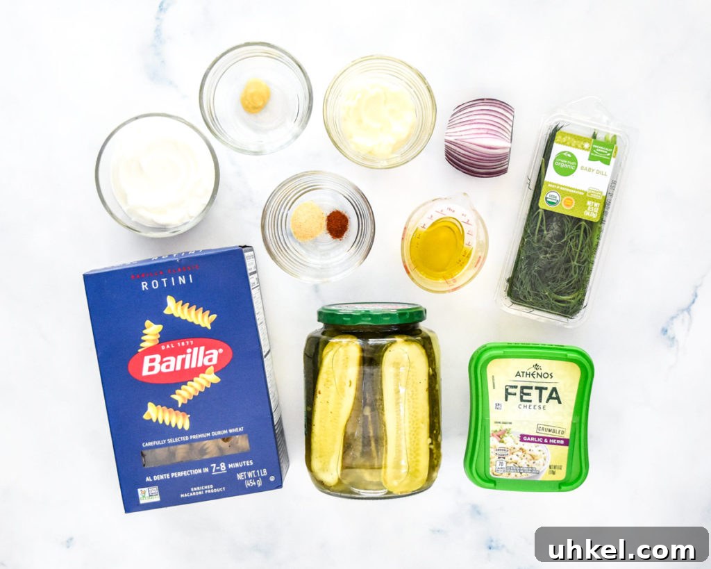 Creamy Dill Pickle Pasta Salad Recipe for Summer Potlucks 5 ingredients required to make dill pickle pasta salad.
