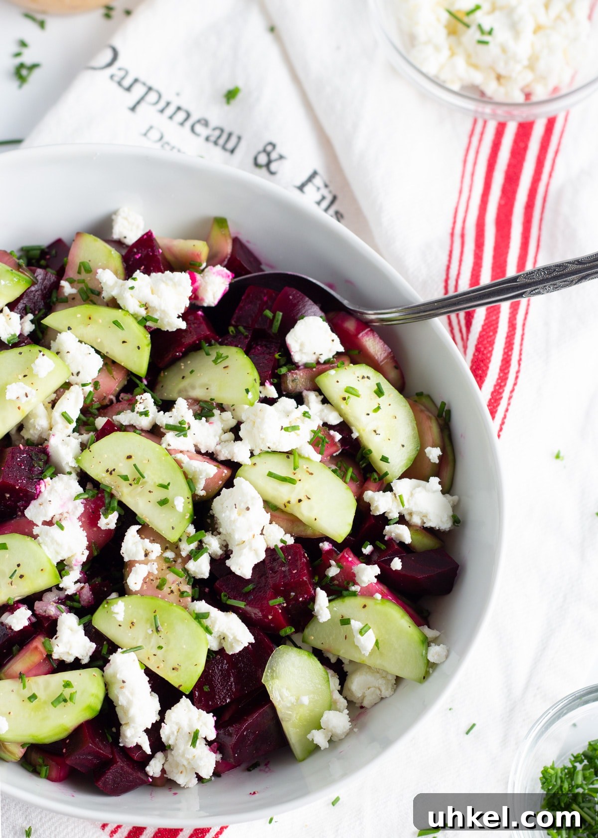 Roasted Beet and Cucumber Salad with Creamy Goat Cheese 2 picture of a large bowl with beet cucumber goat cheese salad.