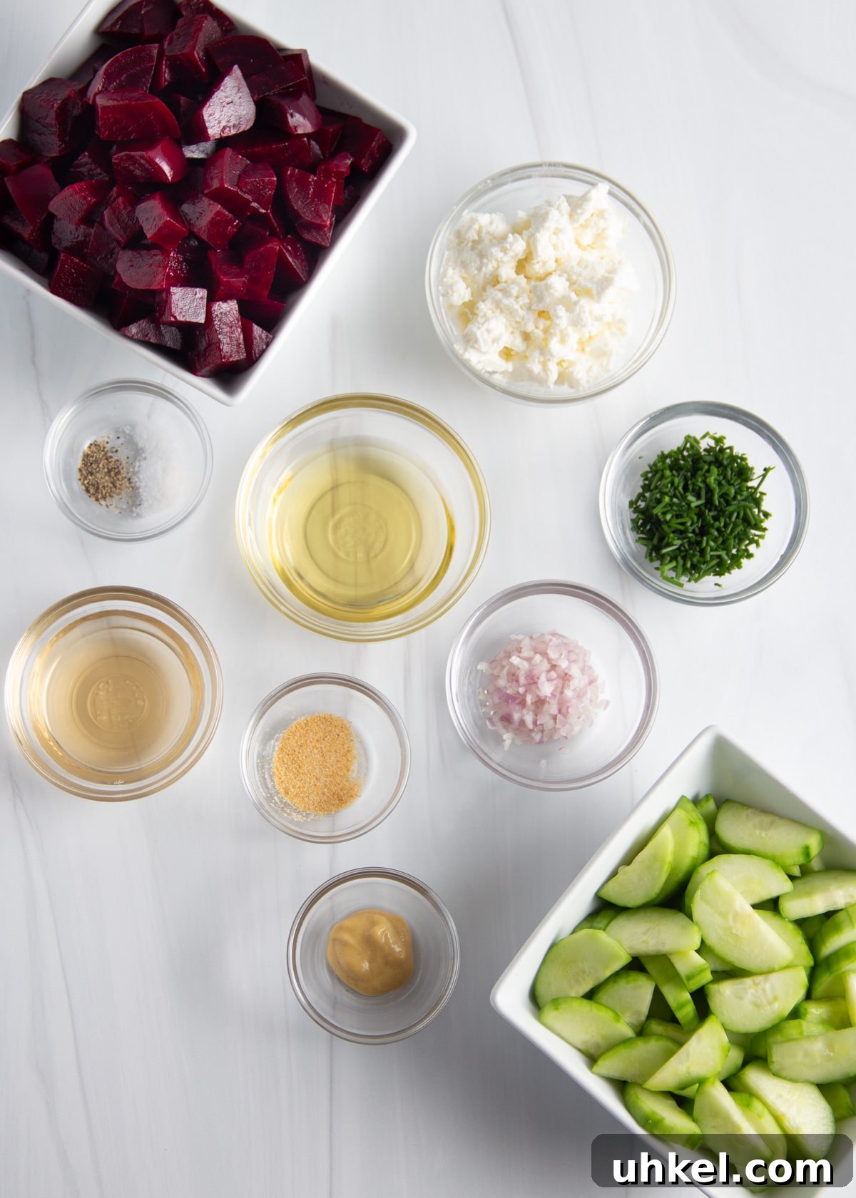 Roasted Beet and Cucumber Salad with Creamy Goat Cheese 3 picture of all ingredients in separate little bowls.