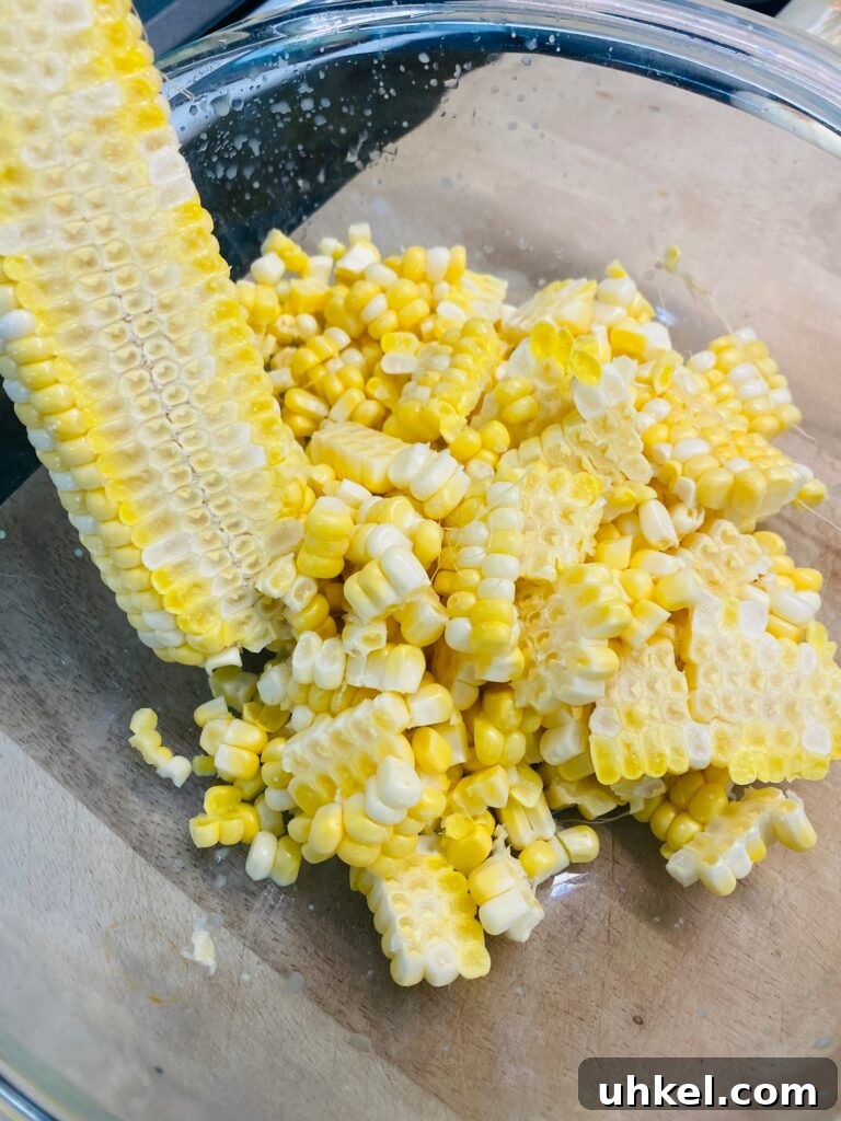 Blackstone Street Corn Dip Recipe for Grilled Skillet Corn 4 cutting corn off the cob