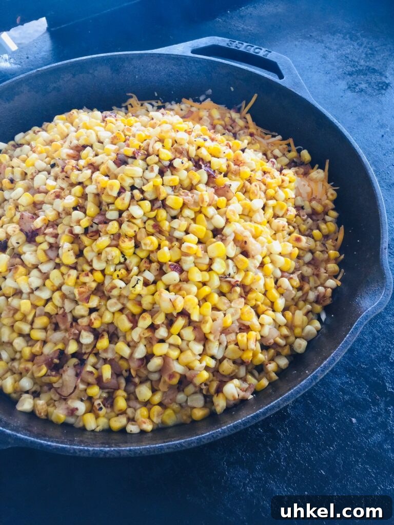 Blackstone Street Corn Dip Recipe for Grilled Skillet Corn 9 adding corn to the skillet