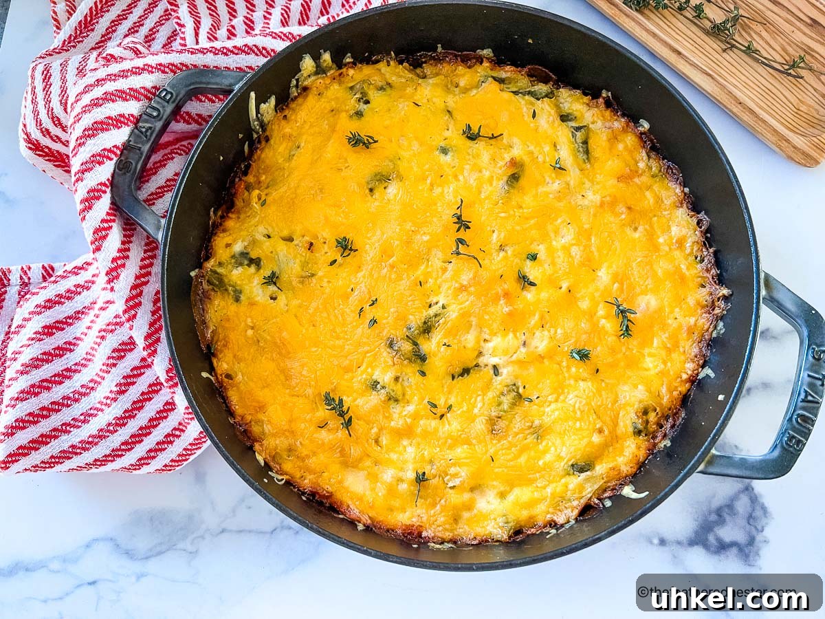 Crispy Hash Brown Chicken Casserole with Cheesy Topping 8 a casserole dish of hash brown chicken casserole.