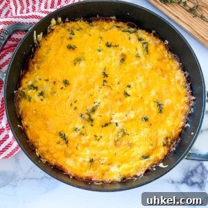 Crispy Hash Brown Chicken Casserole with Cheesy Topping 9 a skillet of hash brown casserole ready to serve.