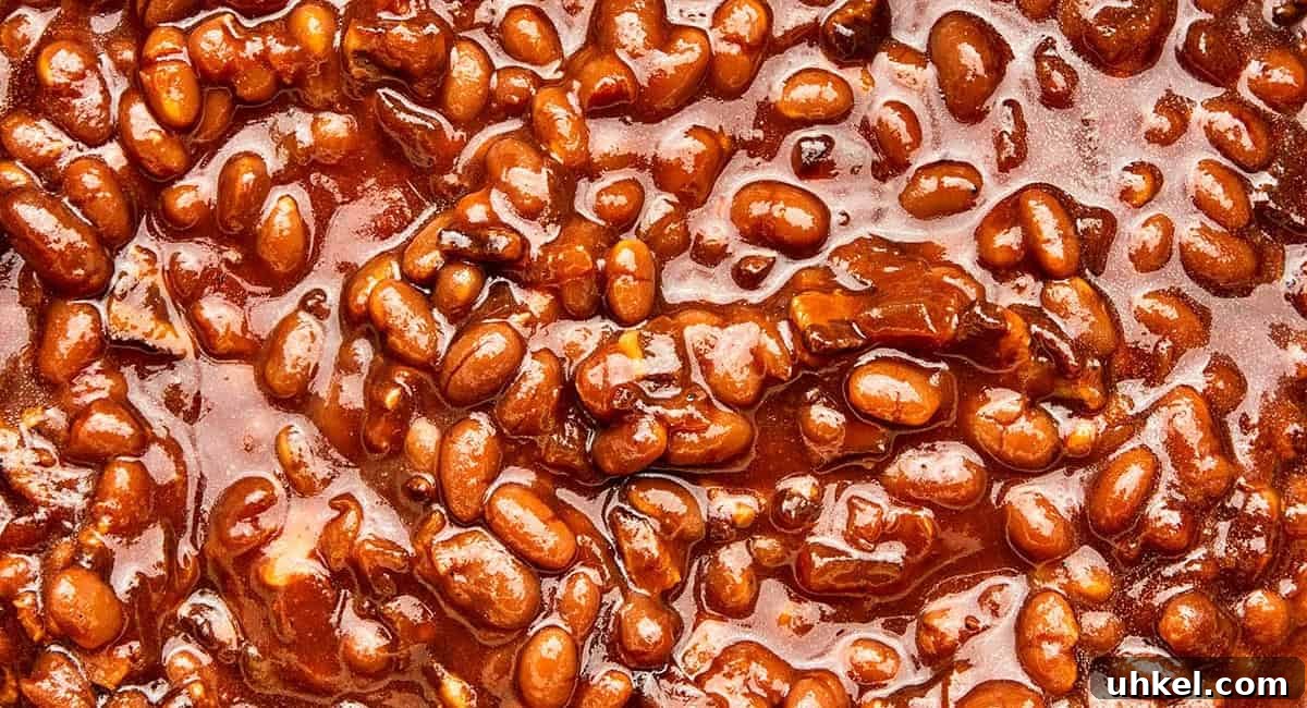 Up close image of molasses baked beans. 