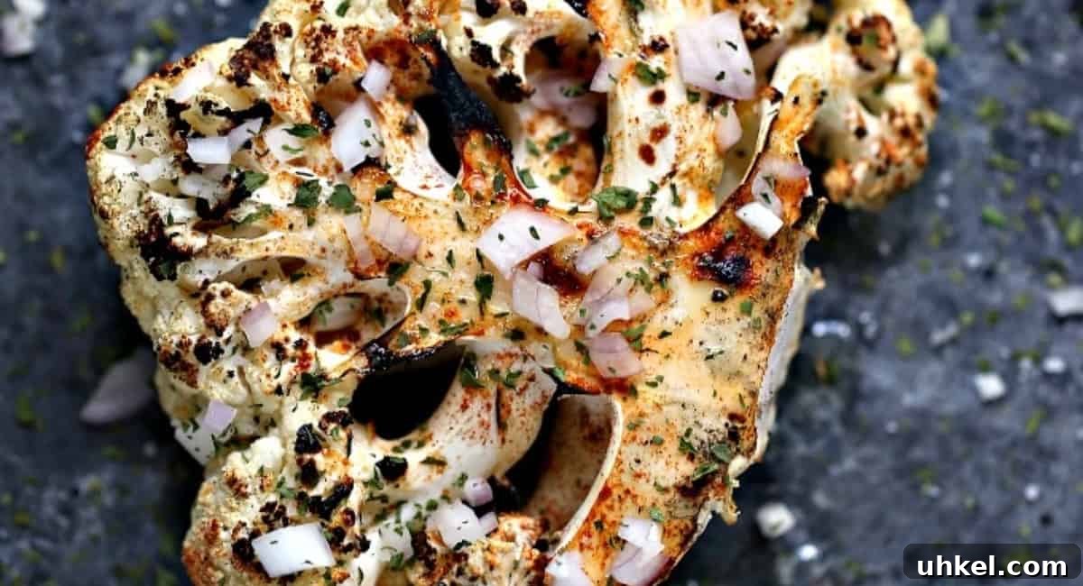 Overhead image of grilled spicy cauliflower steaks. 