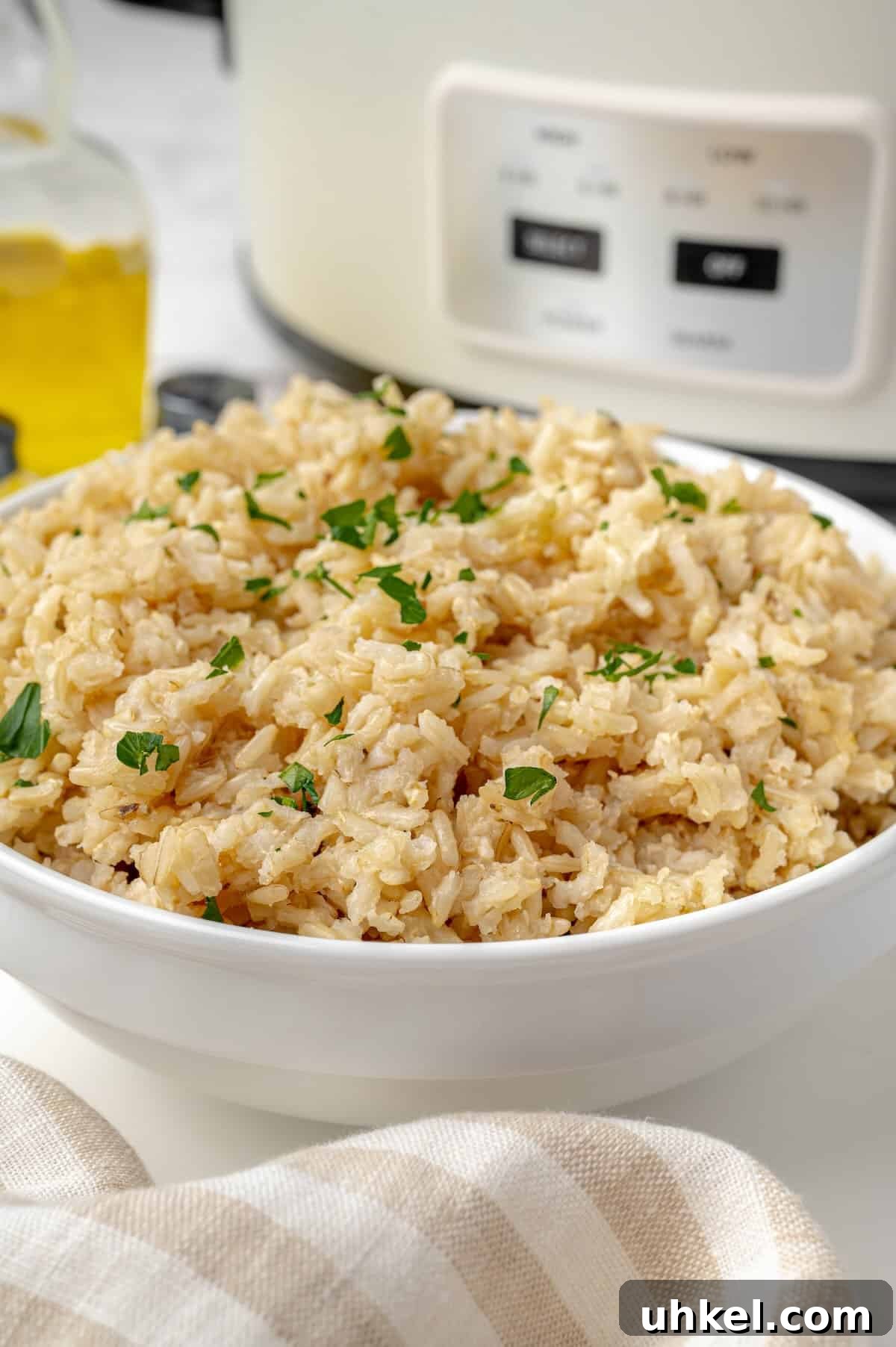 Slow Cooker Brown Rice: Perfect Crockpot Ratio for Fluffy Grains 3 Serving bowl of slow cooker brown rice.