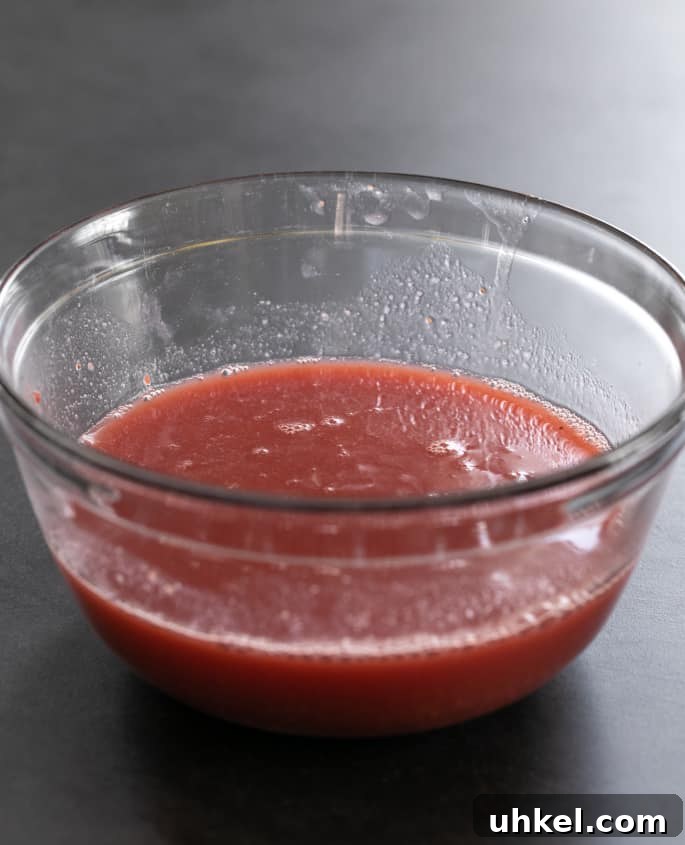 Whipped Jell-O Style Gelatin Dessert Recipe 4 Warm strawberry homemade jello mixture in a bowl
