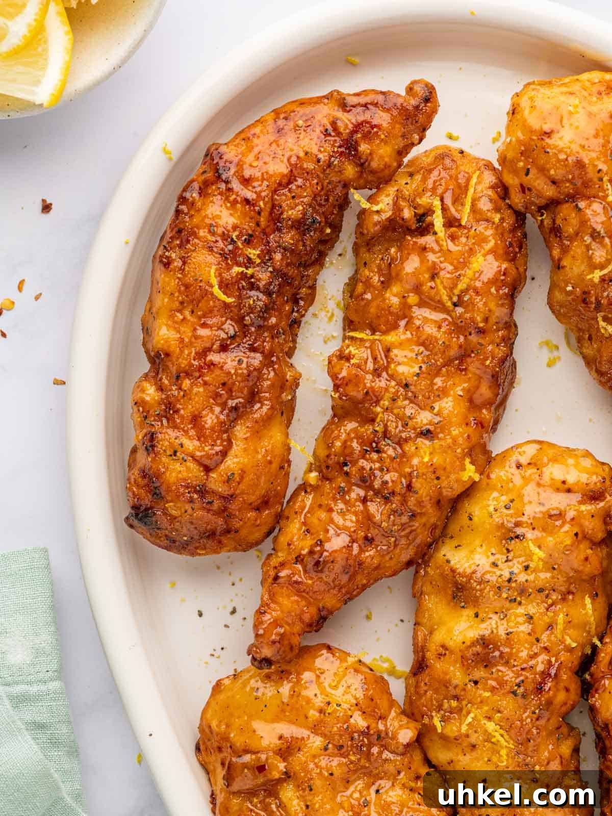Crispy Lemon Pepper Chicken Strips Recipe 12 Crispy baked lemon pepper chicken strips with glaze.