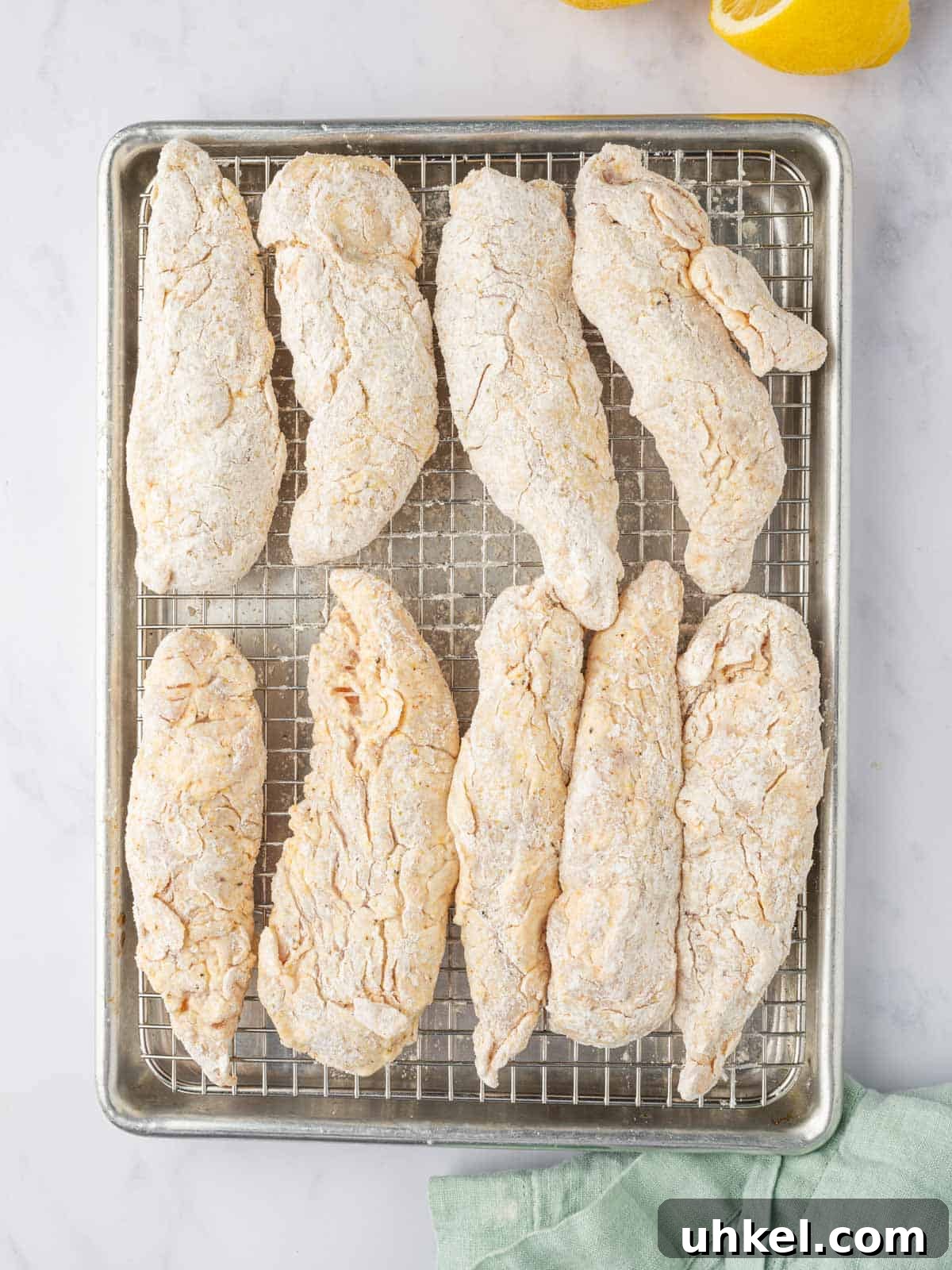 Crispy Lemon Pepper Chicken Strips Recipe 6 Rest the breaded chicken fingers on a baking rack.