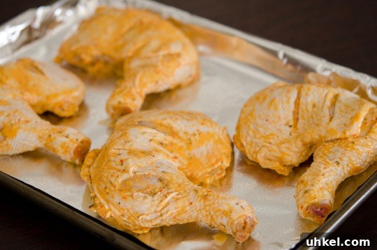 piri piri chicken-6 Chicken legs marinated with peri peri sauce is getting ready to bake.