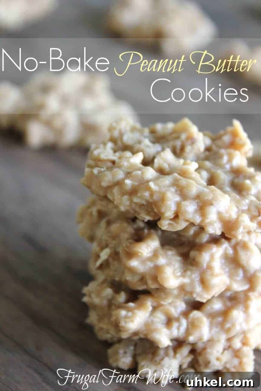 Image shows a close up of several no bake peanut butter cookies stacked on one another on a table. Text above reads 