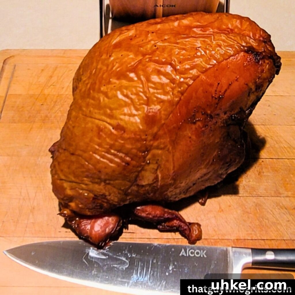 Perfect Turkey Breast Brine Recipe for Juicy, Flavorful Meat 6 Smoked Turkey breast on cutting board with large knife