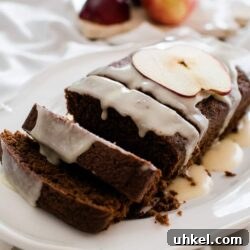 Moist Chocolate Loaf with Bourbon Glaze Recipe 8 chocolate bread with bourbon glaze on a white plate