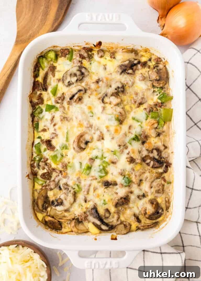 A cheesy casserole with beef, mushrooms and green peppers.