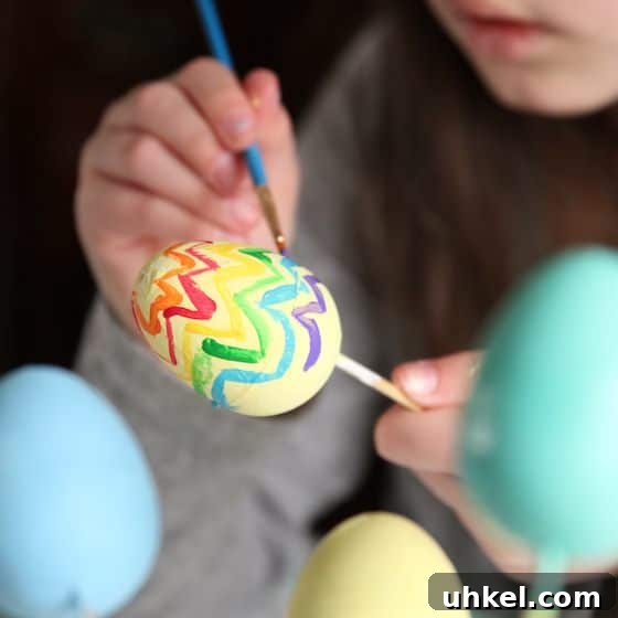 Hand-Painted Plastic Easter Eggs: DIY Decorating Ideas and Tips 8 sophie painting egg
