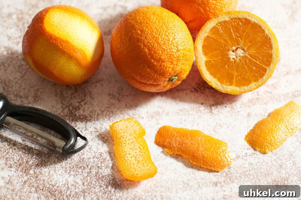 Classic Negroni Cocktail Recipe: How to Mix the Perfect Negroni 4 Twists of orange peel with oranges and a vegetable peeler.