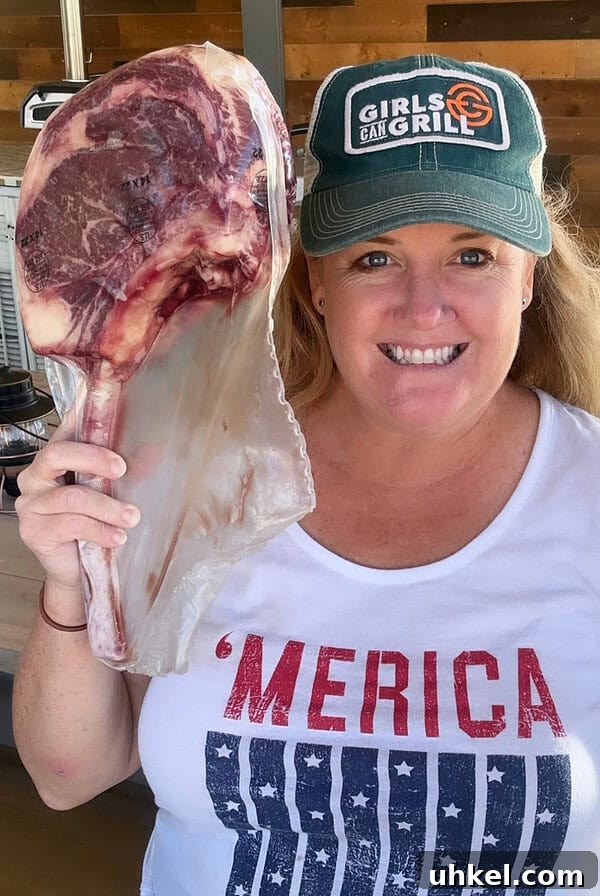 Savory Homemade Dry Rub Recipe for Crispy Chicken Wings 12 Christie Vanover holding a raw steak.