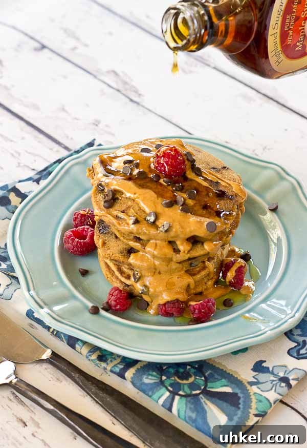 Chocolate Chip Peanut Butter Pancakes Recipe — Fluffy & Decadent 2 Holy yummy in my tummy... Chocolate Chip Peanut Butter Pancakes for the win! Peanut butter flour and mini chocolate chips in a fluffy pancake = breakfast made in heaven.