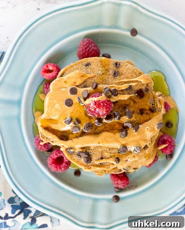 Chocolate Chip Peanut Butter Pancakes Recipe — Fluffy & Decadent 4 Holy yummy in my tummy... Chocolate Chip Peanut Butter Pancakes for the win! Peanut butter flour and mini chocolate chips in a fluffy pancake = breakfast made in heaven.