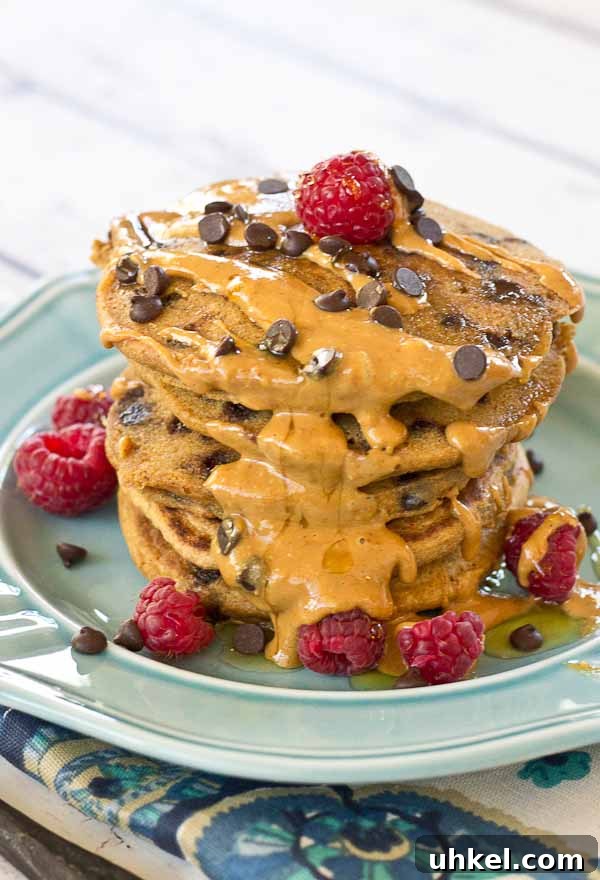 Chocolate Chip Peanut Butter Pancakes Recipe — Fluffy & Decadent 5 Holy yummy in my tummy... Chocolate Chip Peanut Butter Pancakes for the win! Peanut butter flour and mini chocolate chips in a fluffy pancake = breakfast made in heaven.