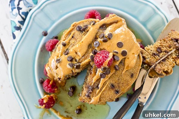 Chocolate Chip Peanut Butter Pancakes Recipe — Fluffy & Decadent 7 Holy yummy in my tummy... Chocolate Chip Peanut Butter Pancakes for the win! Peanut butter flour and mini chocolate chips in a fluffy pancake = breakfast made in heaven.