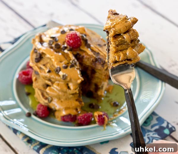 Chocolate Chip Peanut Butter Pancakes Recipe — Fluffy & Decadent 9 Holy yummy in my tummy... Chocolate Chip Peanut Butter Pancakes for the win! Peanut butter flour and mini chocolate chips in a fluffy pancake = breakfast made in heaven.