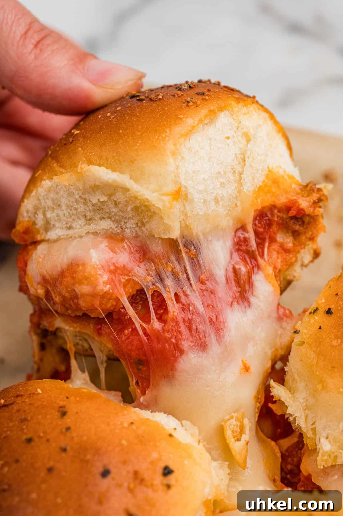 Chicken Parmesan Sliders Recipe: Crispy Mini Sandwiches 11 Pull apart Chicken Parm Sliders with chicken nuggets.