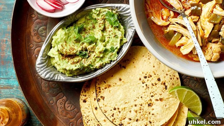 Beer-Braised Chicken Tacos with Toasted Cumin Guacamole